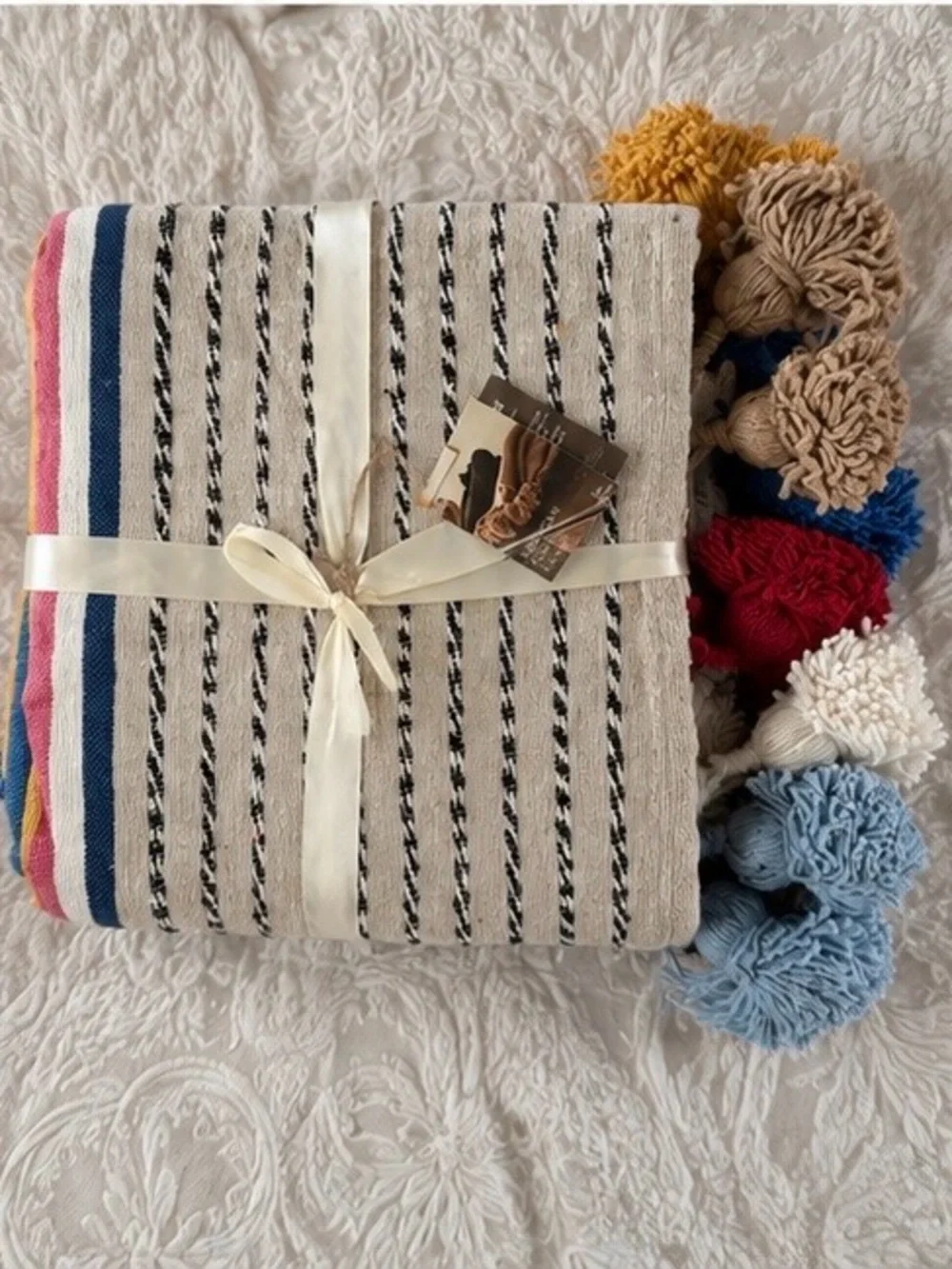Cream Striped Throw with Multi-Colored Pom Poms